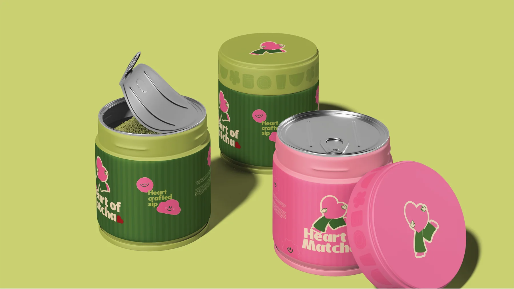 Ribbed green and pink Heart of Matcha tins with lids printed with the mascot pattern. Matcha packaging and CGI by LIRCLE